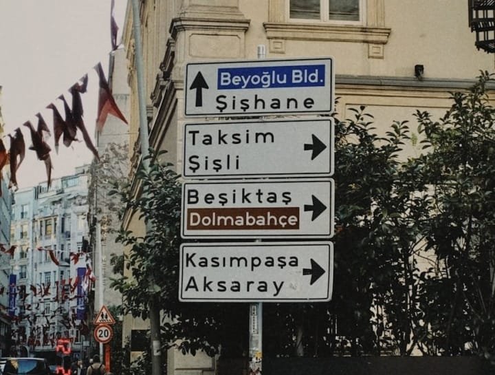 street signages on the sidewalk